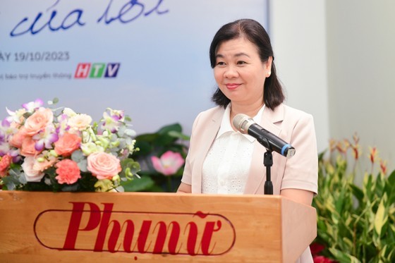 Ms. Ly Viet Trung, editor-in-chief of the Phu Nu TPHCM (HCMC Women) Newspaper speaks at the event. (Photo: SGGP)