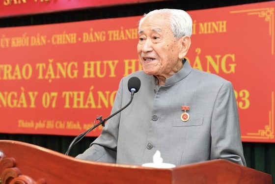 Party member Pham Van Bay speaks at the event. (Photo: SGGP)