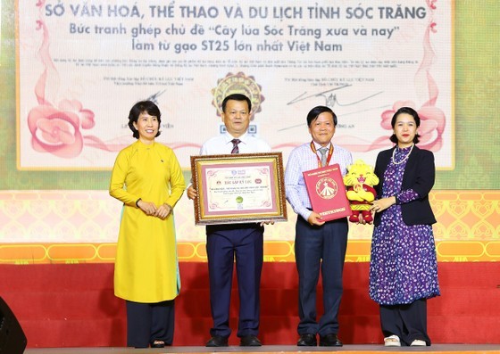At a ceremony offering a record to a painting made of ST rice in the Mekong Delta province of Soc Trang for the biggest of its kind