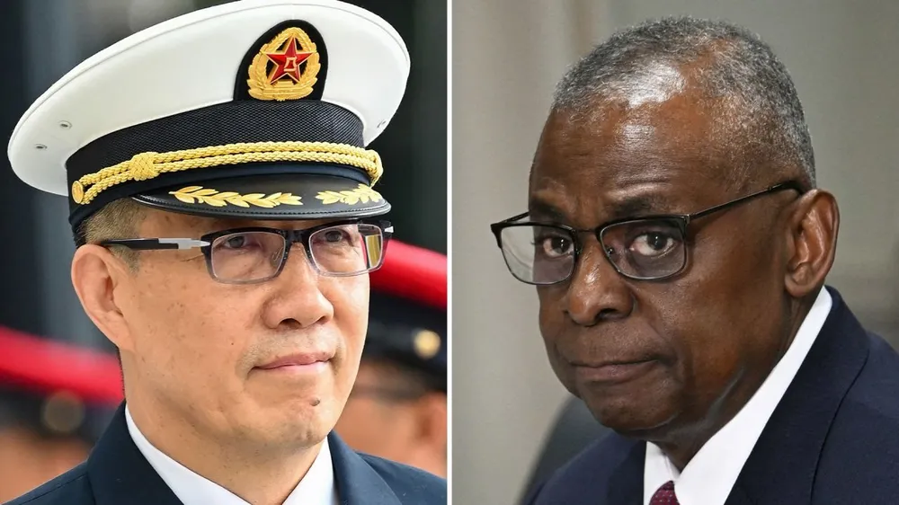 Bộ trưởng Quốc phòng Trung Quốc Đổng Quân và Bộ trưởng Quốc phòng Mỹ Lloyd Austin. Ảnh: CNN