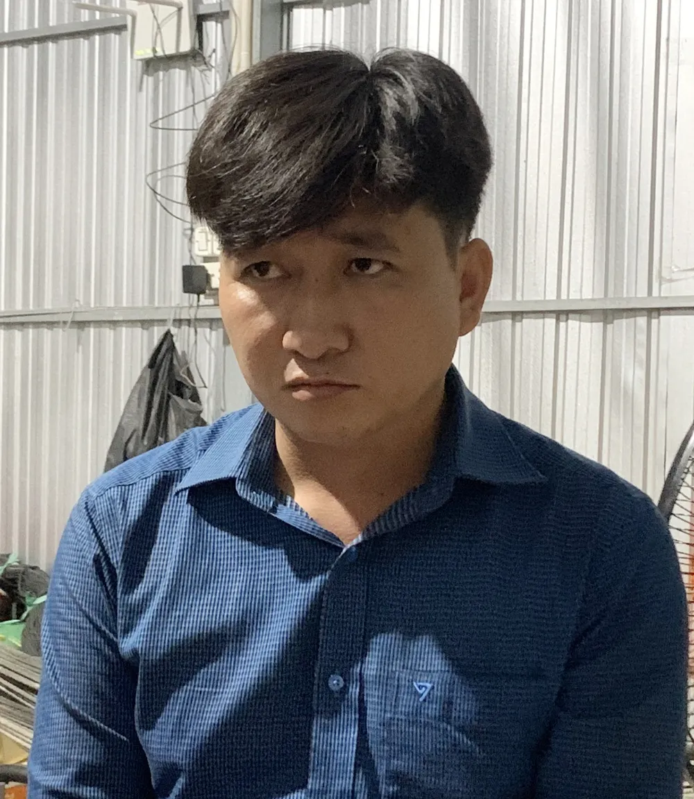 Nguyễn Văn Duy làm việc với cơ quan công an. Ảnh: CTV