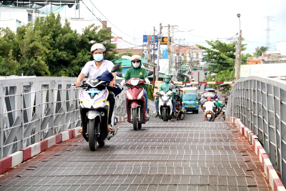 本市-隆安省将通过各项重点项目加强连接（图为：未来期间将优先投建的蝙蝠涌桥）。