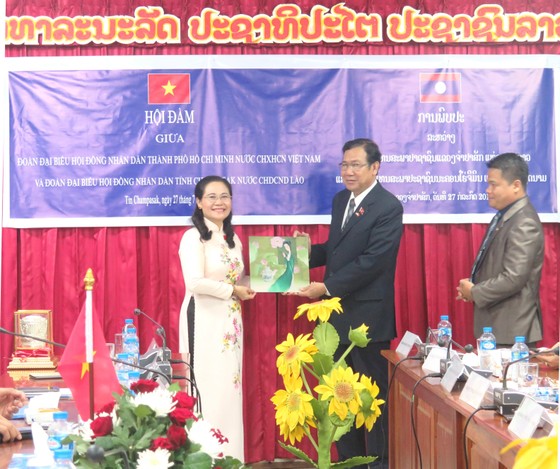 Lào đề nghị HĐND TPHCM chia sẻ kinh nghiệm phối hợp với chính quyền ảnh 4