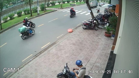 Bắt băng cướp kéo lê cô gái trẻ trên đường phố ảnh 1