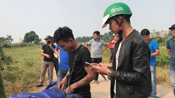 Dựng lại hiện trường hai nghi phạm sát hại tài xế Grab ảnh 2