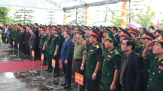 An táng 12 hài cốt liệt sĩ hy sinh trên đất bạn Lào ảnh 2