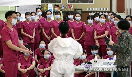 Hàn Quốc: Gần 5.200 người nhiễm, 31 người tử vong do Covid-19 ảnh 1