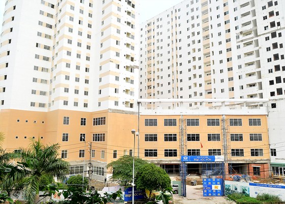 Thị trường bất động sản vẫn tiềm ẩn nhiều rủi ro ảnh 1