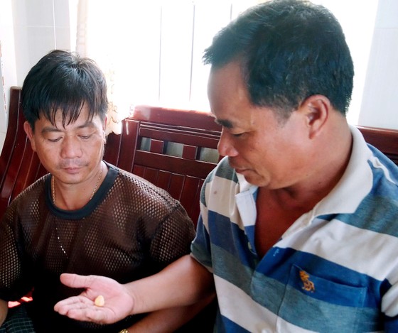 Ngư dân phát hiện viên ngọc quý hiếm trong ốc biển - ảnh 2