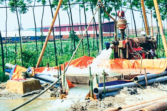 Ngăn chặn nạn khai thác nước ngầm ảnh 1