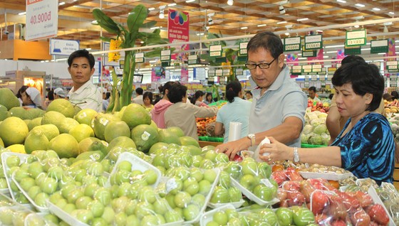 Nhiều hệ thống siêu thị giảm giá sâu hàng hóa thiết yếu ảnh 1