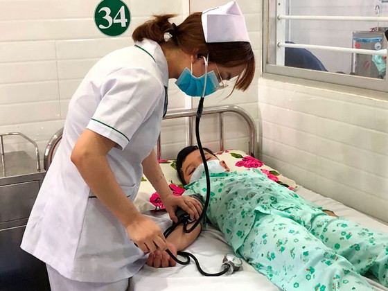 Nỗ lực để 100% HS-SV tham gia bảo hiểm y tế ảnh 1