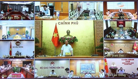 Thủ tướng chỉ đạo bám sát tinh thần 'sống chung với dịch' hình ảnh 2 Thu tuong chi dao bam sat tinh than 'song chung voi dich' hinh anh 2