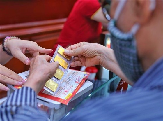 Vàng tiếp tục được xem là sự lựa chọn trú ẩn an toàn hình ảnh 2 Vang tiep tuc duoc xem la su lua chon tru an an toan hinh anh 2