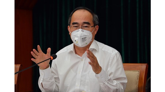 Bí thư Thành ủy TPHCM Nguyễn Thiện Nhân: Bớt thu nhập của cán bộ để hỗ trợ công nhân mất việc ảnh 3
