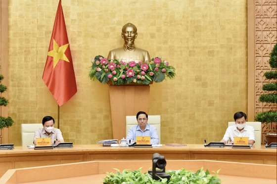 Thủ tướng Phạm Minh Chính chủ trì cuộc họp. Ảnh: VIẾT CHUNG