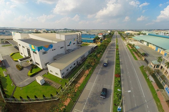 COVID-19 has caused temporary difficulties for upcoming business plans, but with a long-term investment strategy, industrial real estate in Vietnam is still very attractive. —Photo doanhnghiepphattrien.vn