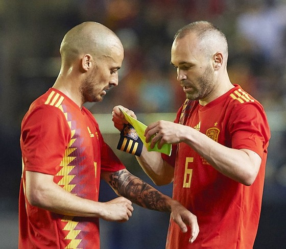 Silva và Iniesta đóng vai trò “bộ não” của Tây Ban Nha ở World Cup lần này. Ảnh: Getty Images