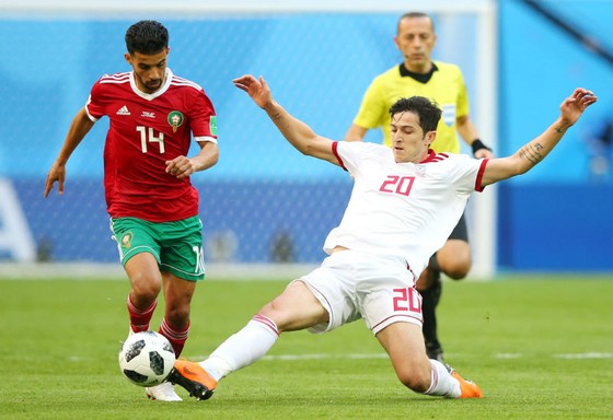 Morocco (trái) đã hứng chịu thất bại cay đắng  trong một diễn biến mà họ đã chơi tốt hơn so với Iran. Ảnh: Getty Images