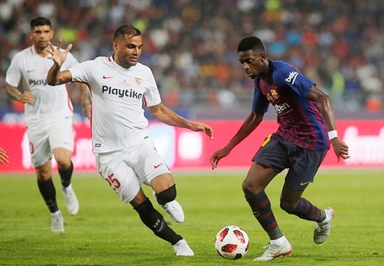 Dembele có màn trình diễn tốt trước Sevilla. Ảnh Reuters.