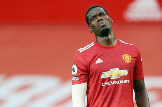 Paul Pogba và dáng vẻ thất vọng trong thảm bại 1-6 trước Tottenham. Ảnh: Getty Images