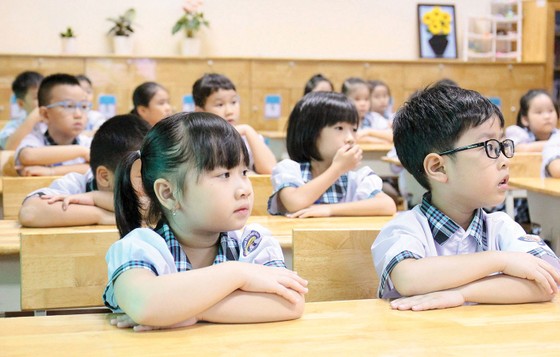 Học sinh lớp 1 Trường Tiểu học Lê Đức Thọ, quận Gò Vấp, TPHCM trong một tiết học.  Ảnh: HOÀNG HÙNG