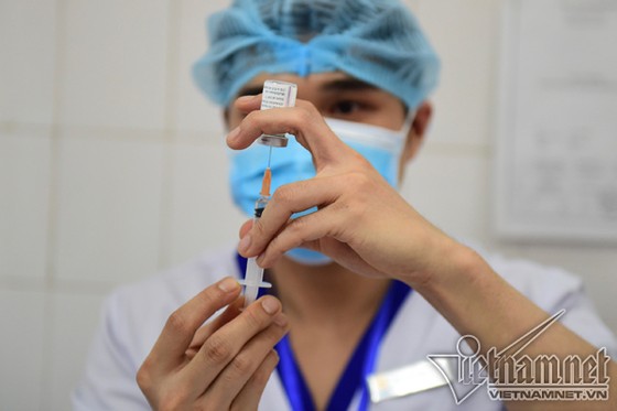 Dùng 12.100 tỷ đồng nguồn tiết kiệm chi năm 2020 mua vaccine Covid-19 ảnh 1
