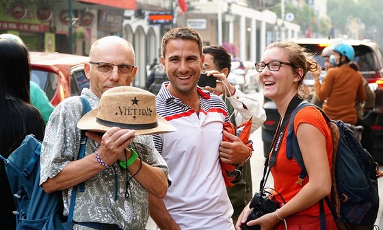 A group of French tourists visit the capital of Hanoi in February, 2019. Photo by VnExpress/Phong Vinh