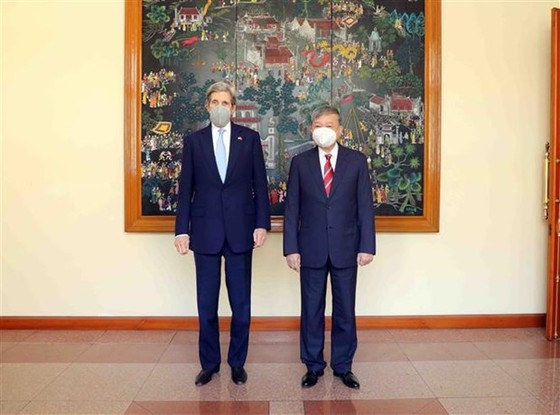 Minister of Public Security General To Lam (R) and US Special Presidential Envoy for Climate