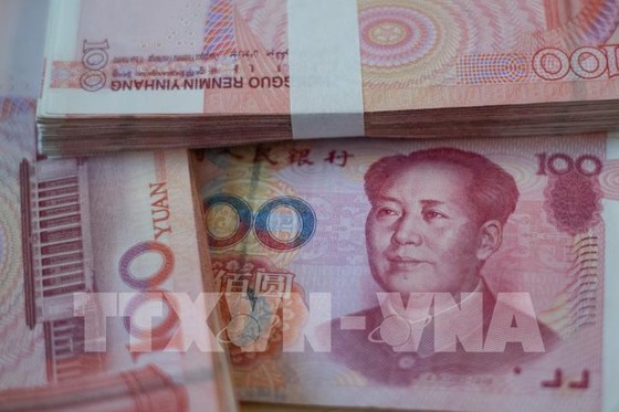 Trung Quốc nâng giá NTD lên mức cao nhất trong 30 tháng