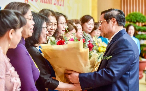 Thủ tướng Phạm Minh Chính gặp gỡ các doanh nghiệp doanh nhân tiêu biểu năm 2021. Ảnh: V.Chung