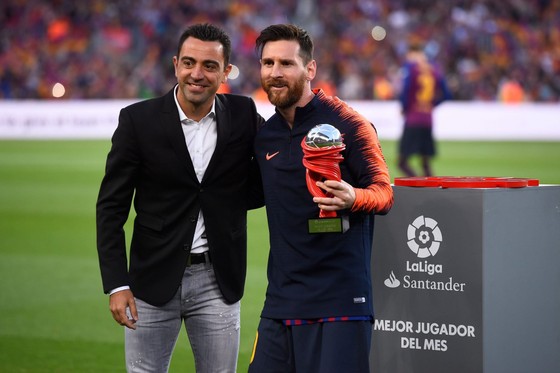 Xavi và Messi