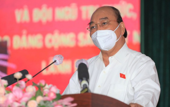 Chủ tịch nước Nguyễn Xuân Phúc: TPHCM khởi động mạnh mẽ, bài bản, căn cơ “cỗ xe tam mã” ảnh 1