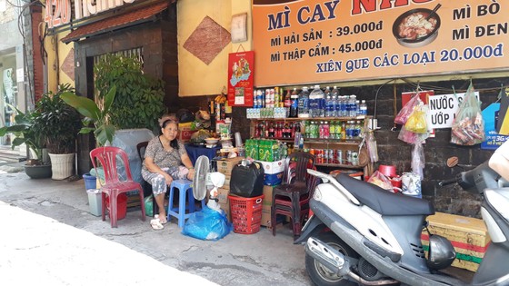 Bắt người phụ nữ chở trẻ con đi trộm cắp ở quận 3 ảnh 2 Bắt người phụ nữ chở trẻ con đi trộm cắp ở quận 3 ảnh 2