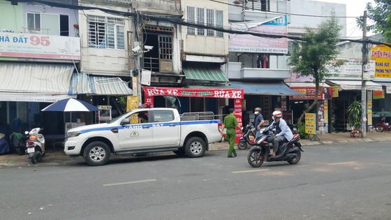 Điều tra làm rõ vụ nghi phóng hỏa đốt tiệm sửa xe ở quận Tân Bình ảnh 1