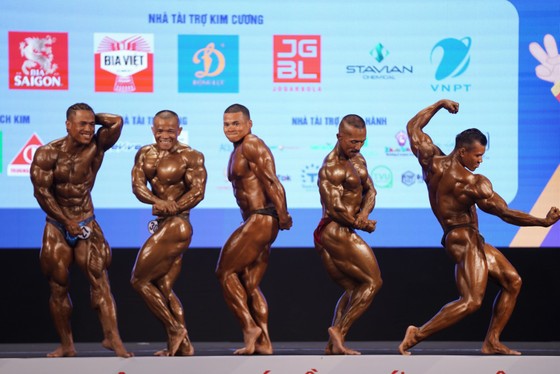 Thân hình cuồn cuộn của lực sĩ Trần Hoàng Duy Thuận vừa giành huy chương vàng ảnh 9