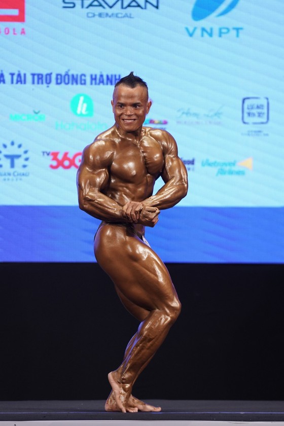 Thân hình cuồn cuộn của lực sĩ Trần Hoàng Duy Thuận vừa giành huy chương vàng ảnh 3