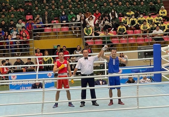 Nguyễn Văn Đương (xanh) đã có kỳ Đại hội thể thao toàn quốc thành công. Ảnh: N.V.Đ