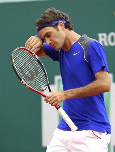 Federer bị loại
