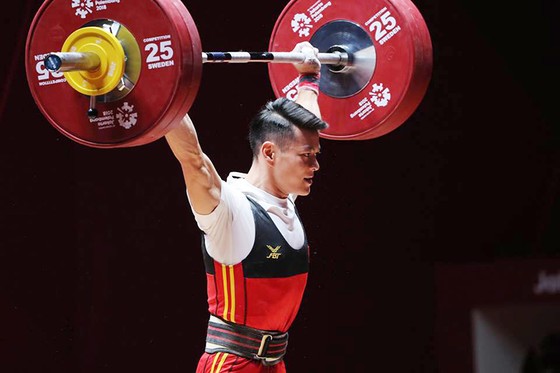 Rất nỗ lực nhưng Thạch Kim Tuấn chỉ đoạt được HCB hạng cân 56kg nam. Ảnh: DŨNG PHƯƠNG