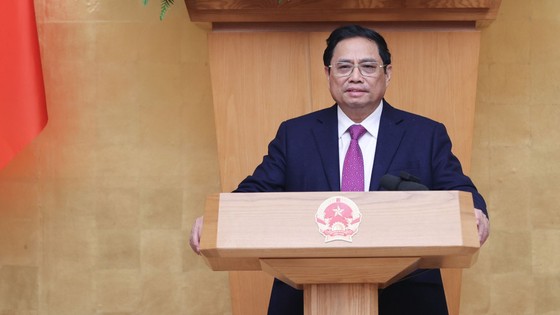 Thủ tướng Phạm Minh Chính chủ trì cuộc họp Thường trực Chính phủ về tình hình tổ chức Tết Nguyên đán năm 2023. Ảnh: VIẾT CHUNG