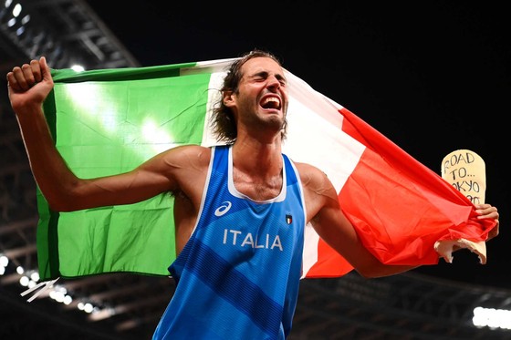 Hai VĐV cùng chia sẻ huy chương vàng Olympic ảnh 1 Hai VĐV cùng chia sẻ huy chương vàng Olympic ảnh 1