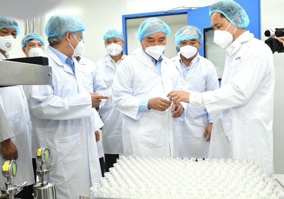 Chủ tịch nước Nguyễn Xuân Phúc: “Vaccine phòng Covid-19 của Việt Nam không chỉ phục vụ Việt Nam mà còn vươn ra toàn cầu” ảnh 1
