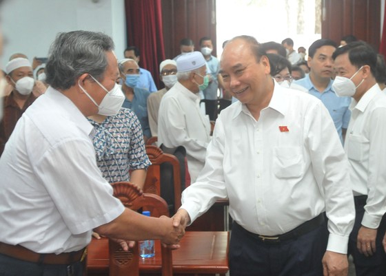 Chủ tịch nước Nguyễn Xuân Phúc: TPHCM đi đầu trong phục hồi kinh tế - xã hội sau dịch ảnh 3
