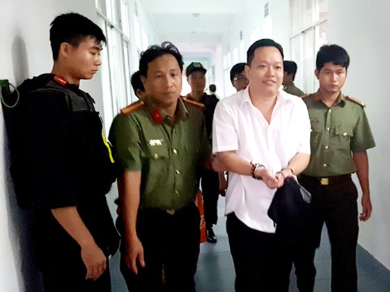 Nguyễn Huỳnh Đạt Nhân, Giám đốc Công ty Tây Nam lúc mới bị bắt. Ảnh: LÊ PHƯƠNG