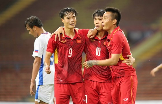 Niềm vui của các cầu thủ Việt Nam. Ảnh: DŨNG PHƯƠNG