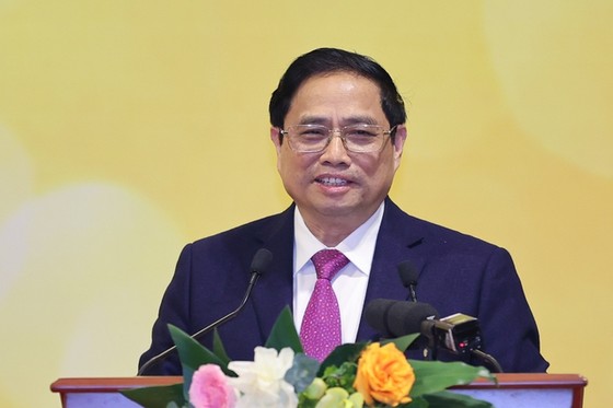 Thủ tướng Phạm Minh Chính nhấn mạnh, một nhiệm vụ quan trọng của ngành ngân hàng là tập trung tháo gỡ khó khăn, thúc đẩy phát triển thị trường bất động sản cả về phía người bán và người mua - Ảnh: VGP