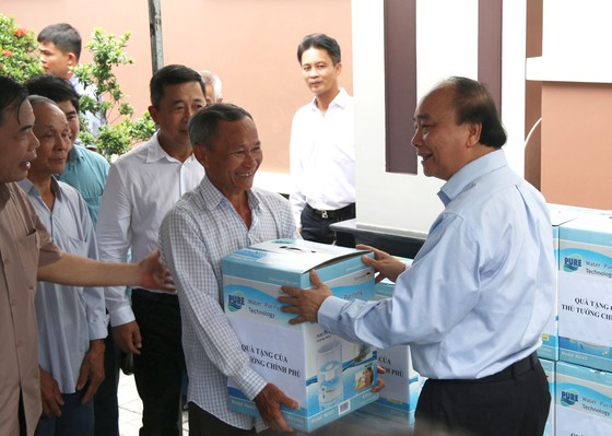 Thủ tướng Chính phủ Nguyễn Xuân Phúc khảo sát vùng chuyên canh sầu riêng tại Tiền Giang ảnh 3