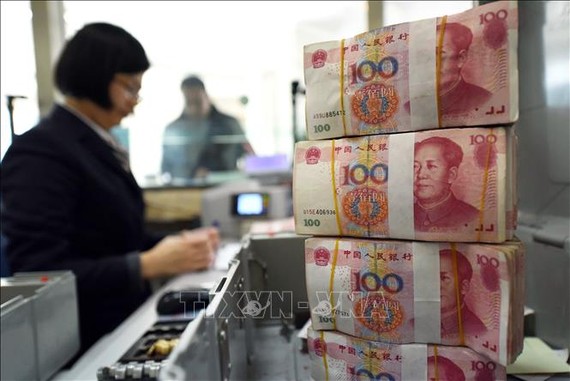Bắc Kinh sẽ đưa ra các chính sách tiền tệ, tài chính thận trọng, linh hoạt hơn. Ảnh minh họa: AFP/TTXVN