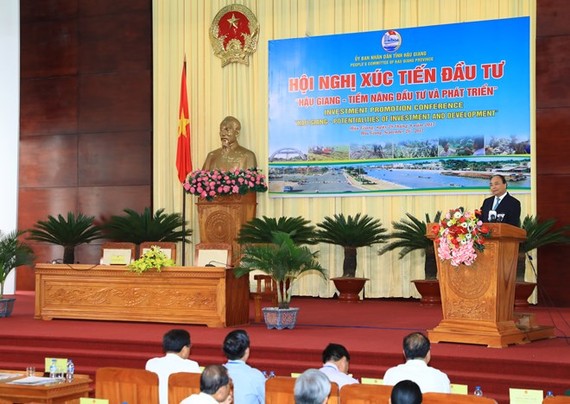 政府總理阮春福出席後江省2017年投資促進會議並致詞。（圖源：越通社）